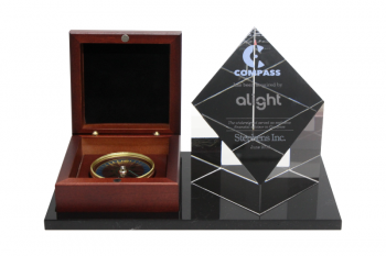 Actual compass mounted on a black plexi base, clear cut-top crystal block at right